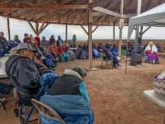 Elders and their families gather at Teesto area on the Navajo Reservation waiting for goods to be distributed. All the food, firewood and other goods are made possible through donations. 